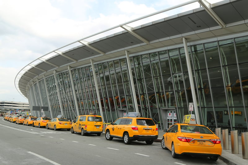 NYC-taxi-at-Delta-Airline-Terminal-4-at-JFK-International-Airport-in-New-York.-JFK-is-one-of-the-biggest-airports-in-the-world-with-4-runways-and-8-terminals.jpg